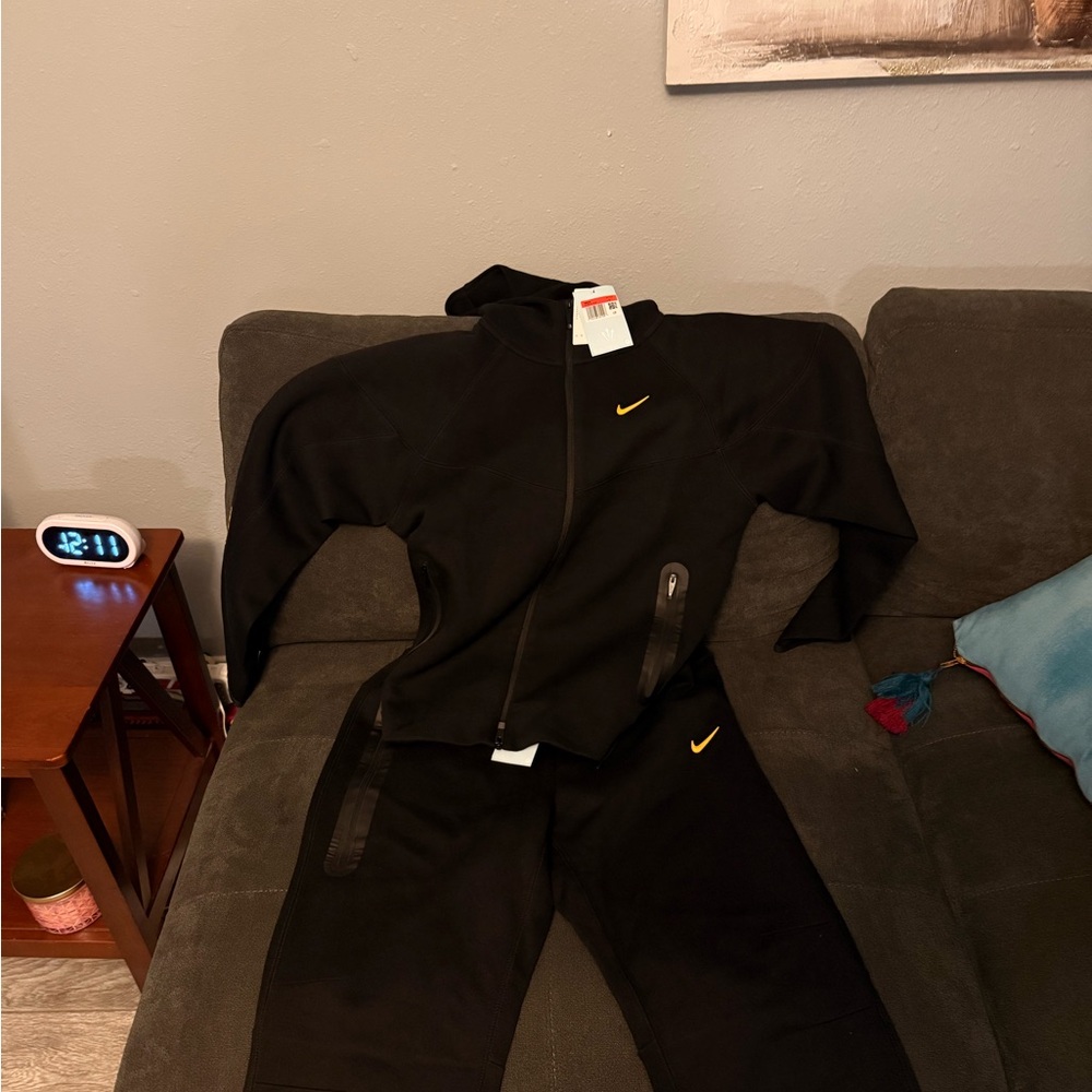 Nike Black Tracksuit with Gold Accents